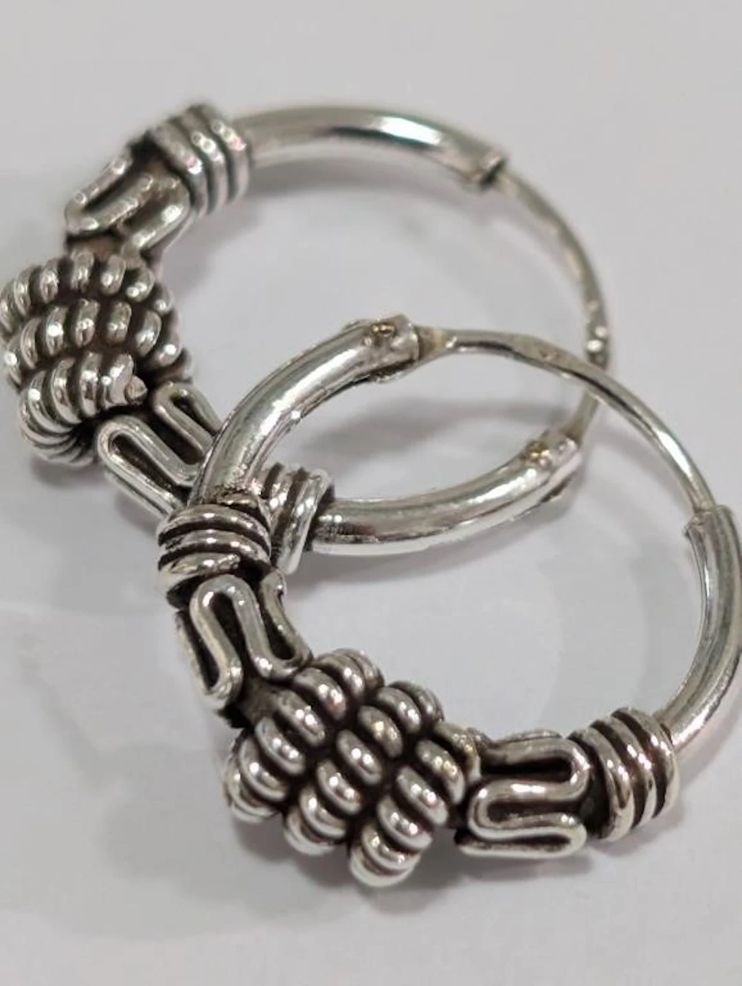 $50, SilverEarring, appraised/retail value $50