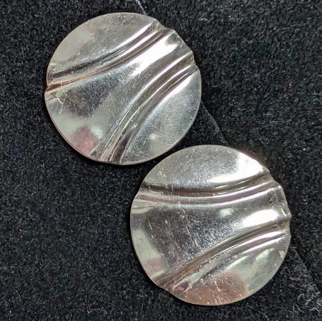 $60, silver(2.37g), earring, retail value $60