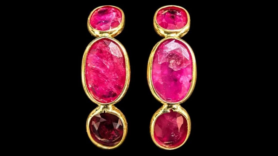 $1275, 10k(1.31g), glass filled ruby (4.4ct)earrin