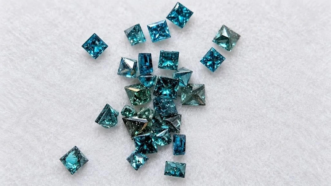 $400, blue diamond treated (0.5ct)gemstone, retail