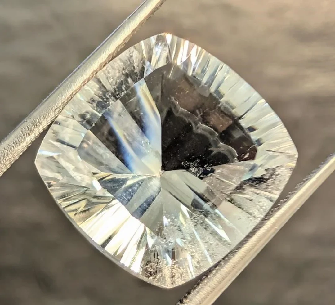 $230, white topaz (13.05ct)gemstone, retail value