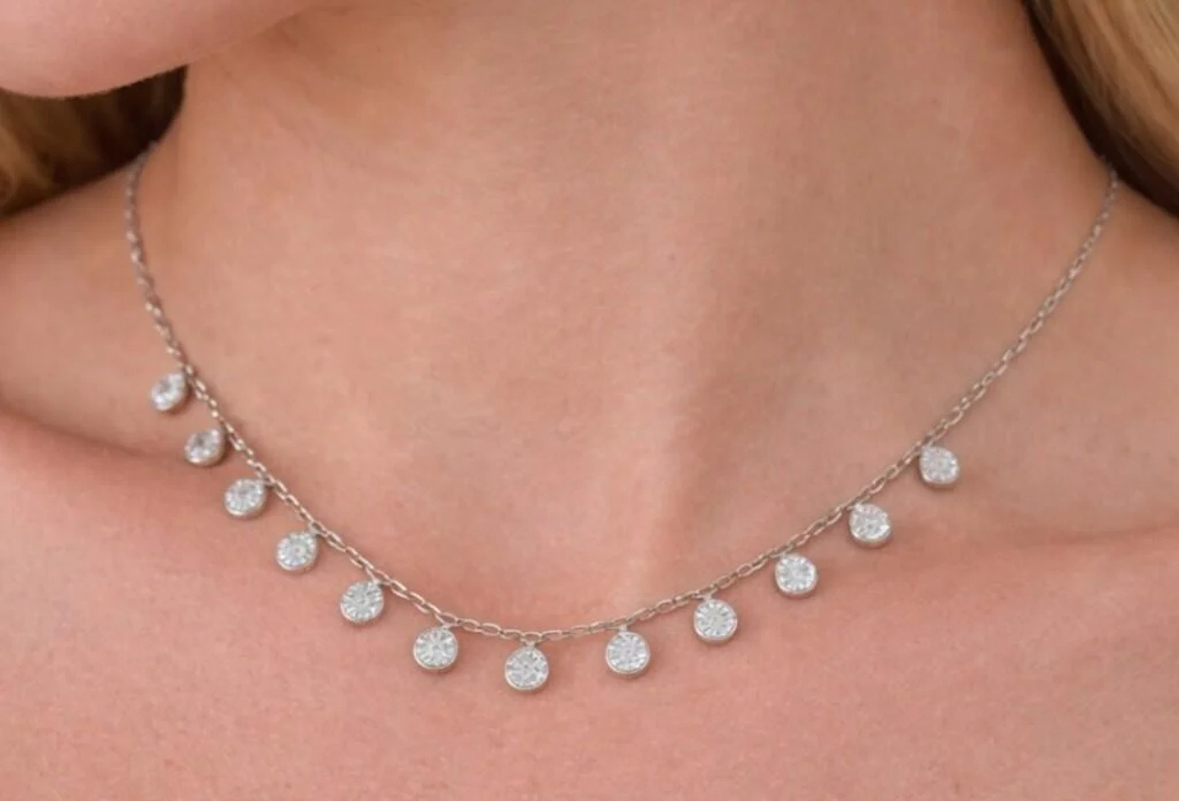 $5000, 10k(4g), moissanite (6.5ct)necklace, retail
