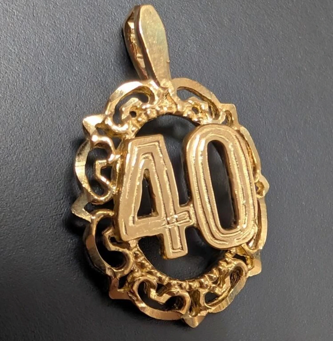 $740, 10k(1.4g), pendant, MSRP $740