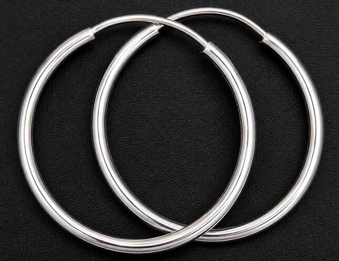 $800, 10k(1g), hoop earring, MSRP $800