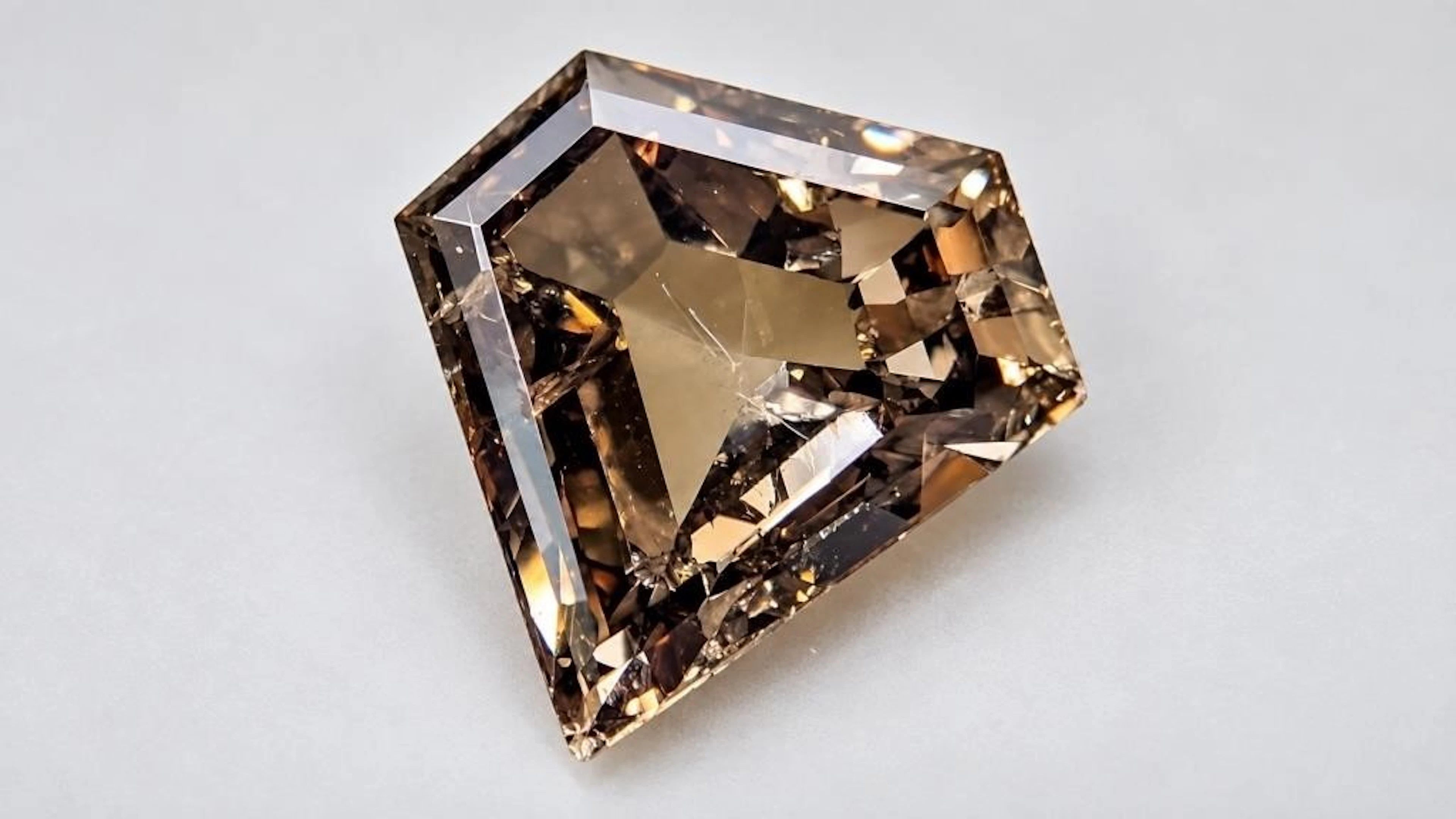 $1000, light brown natural diamond (1.03ct)gemston