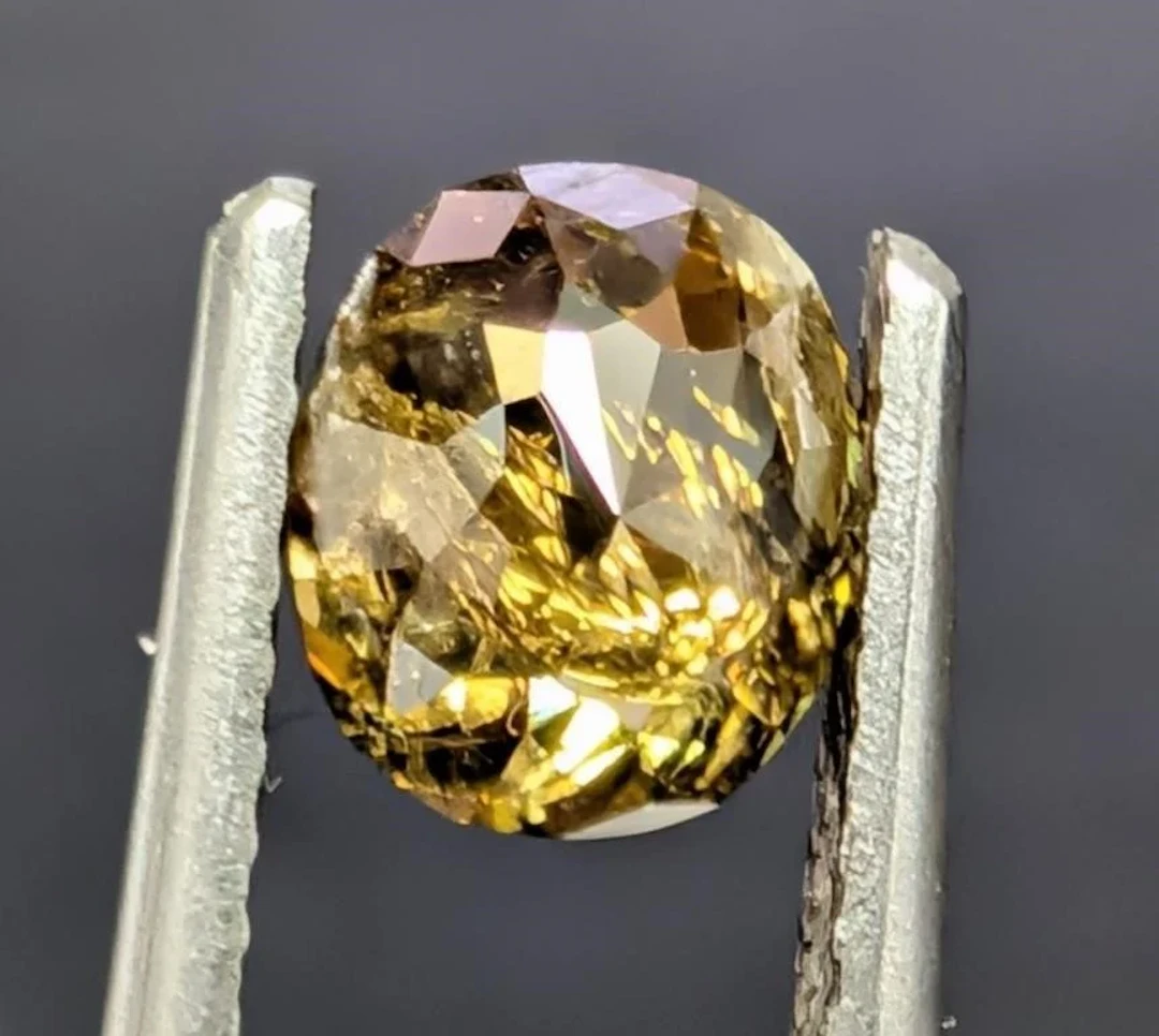 $2400, natural fancy color diamond (0.9ct), retai
