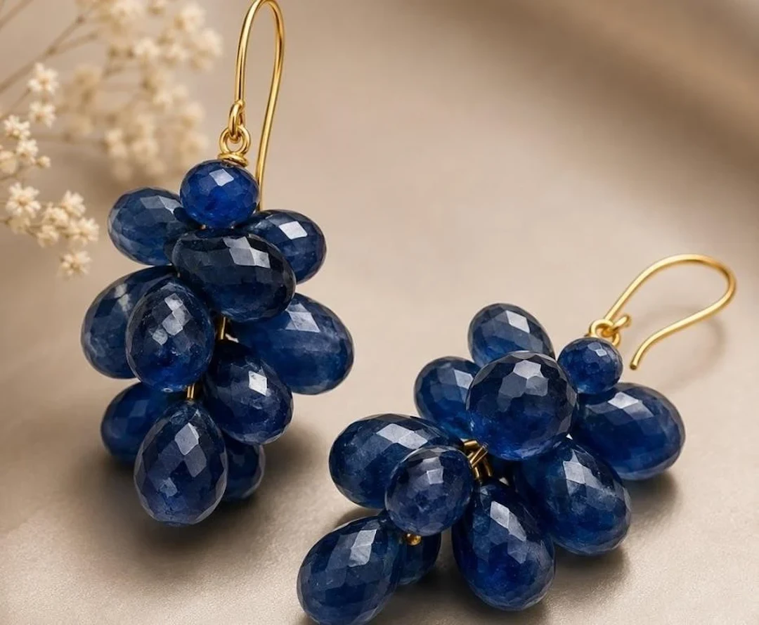 $1400, 10k(7.14g), blue sapphire (34ct) earring