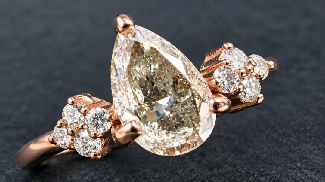 $5435, 10k(2.06g), diamond (1.05ct), diamond (0.16