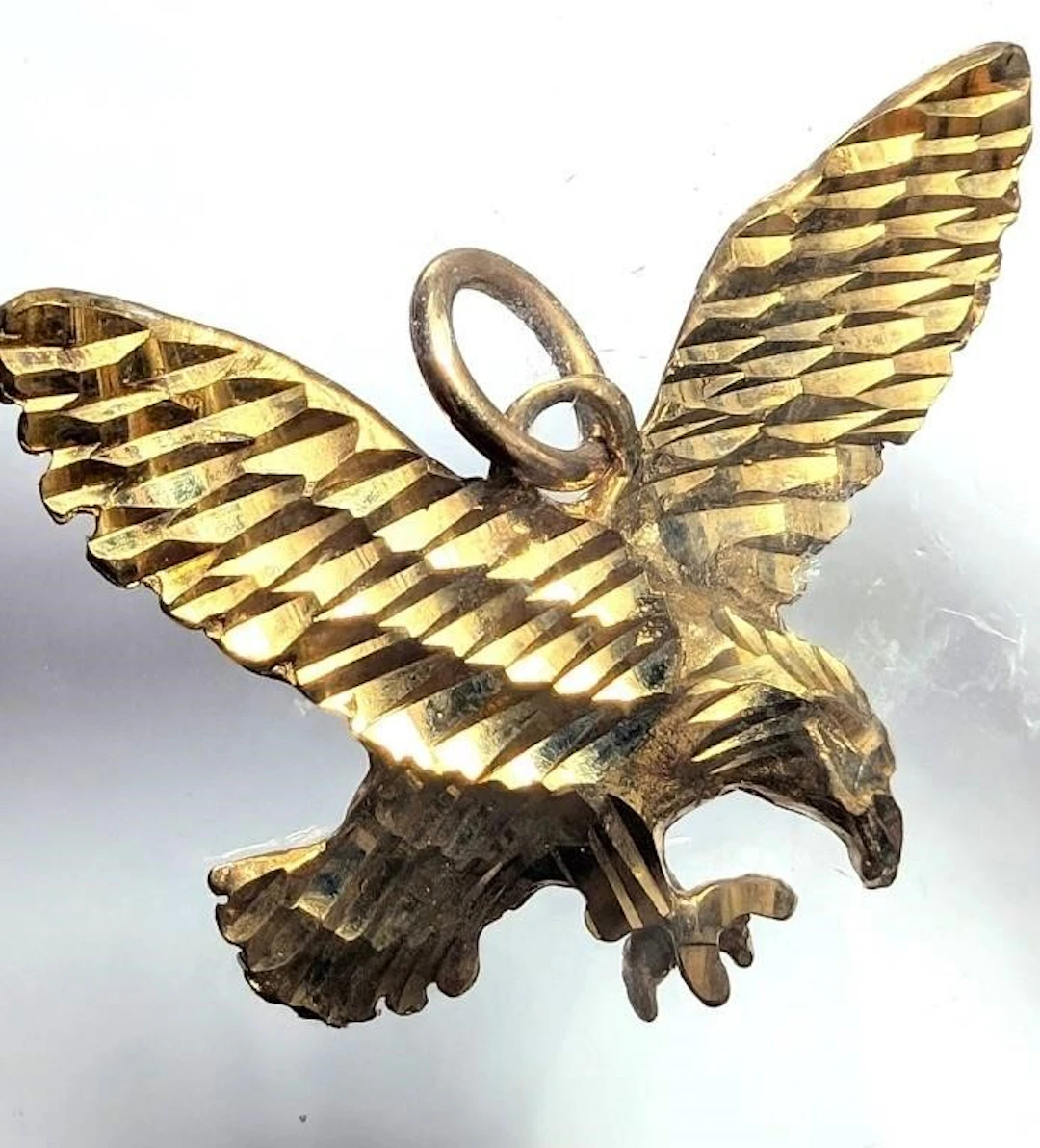$900, 10K(2.2g), PENDANT, retail value $900