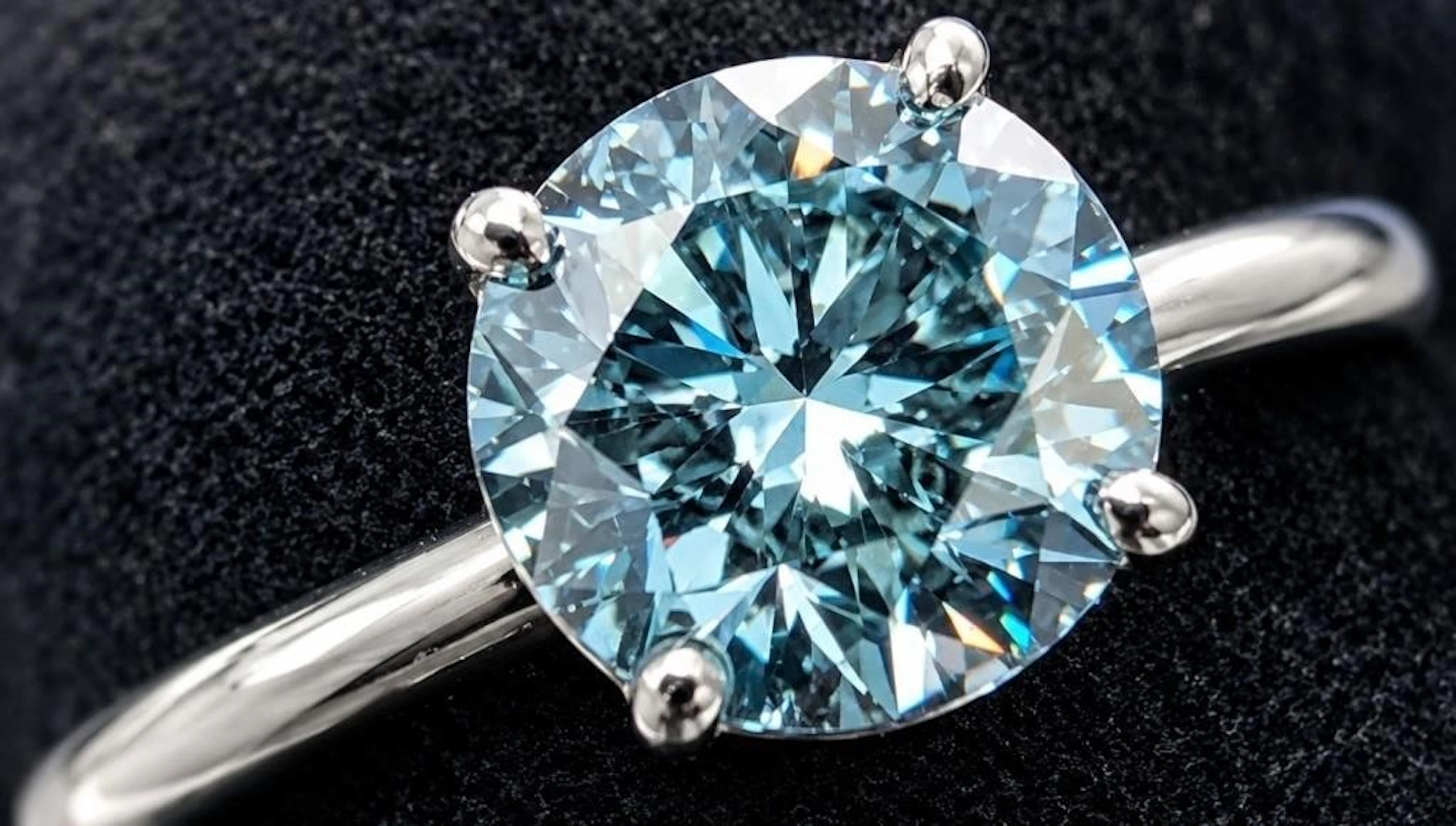 $2400, 10k(1.35g), blue lab diamond (0.66ct)ring