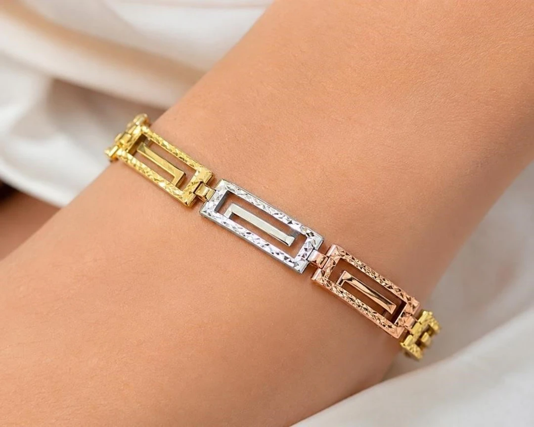 $150, silver(3.18g), tri color bracelet 7", reta