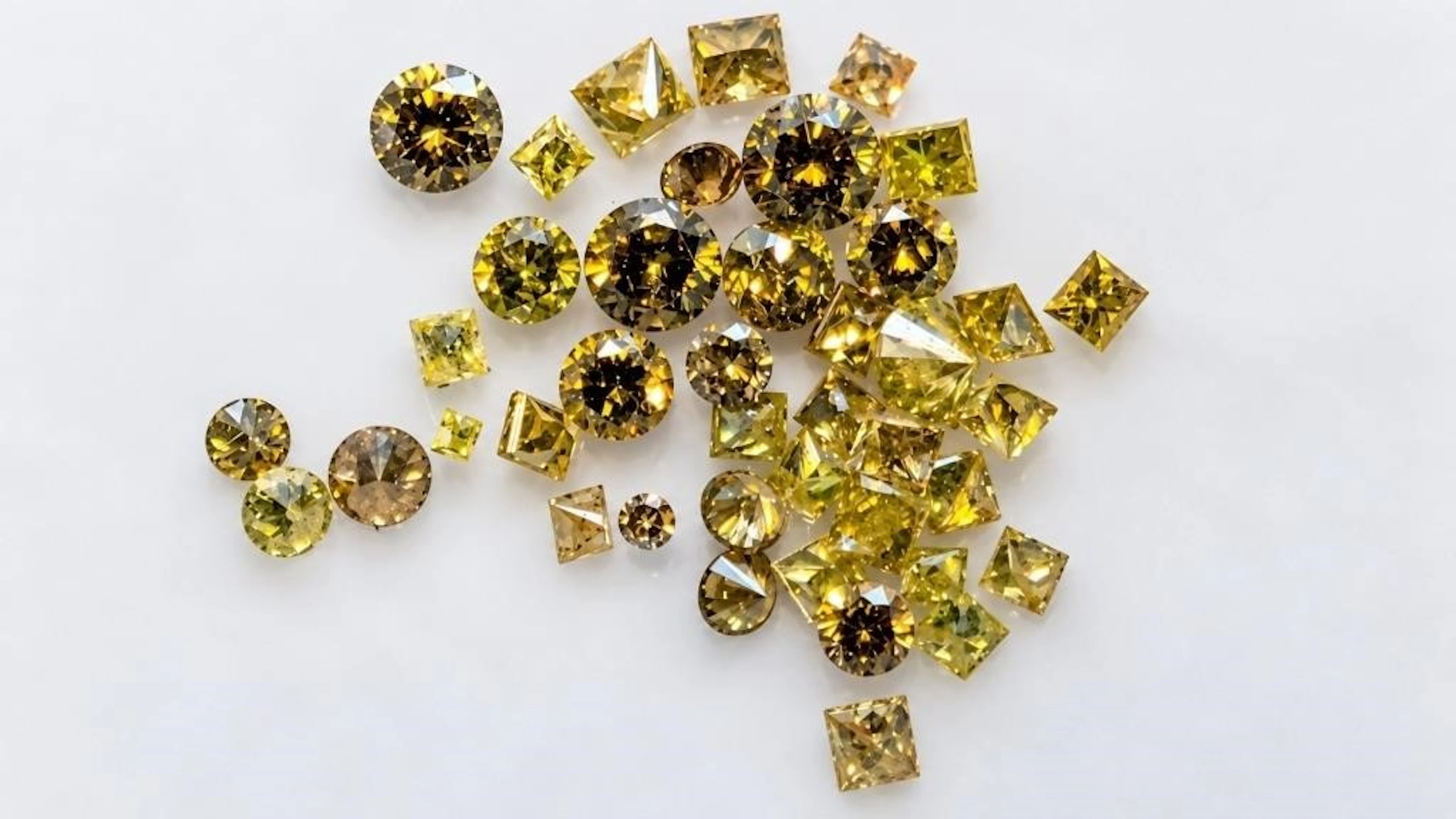 $600, yellow diamond treated (1ct)gemstone, retail