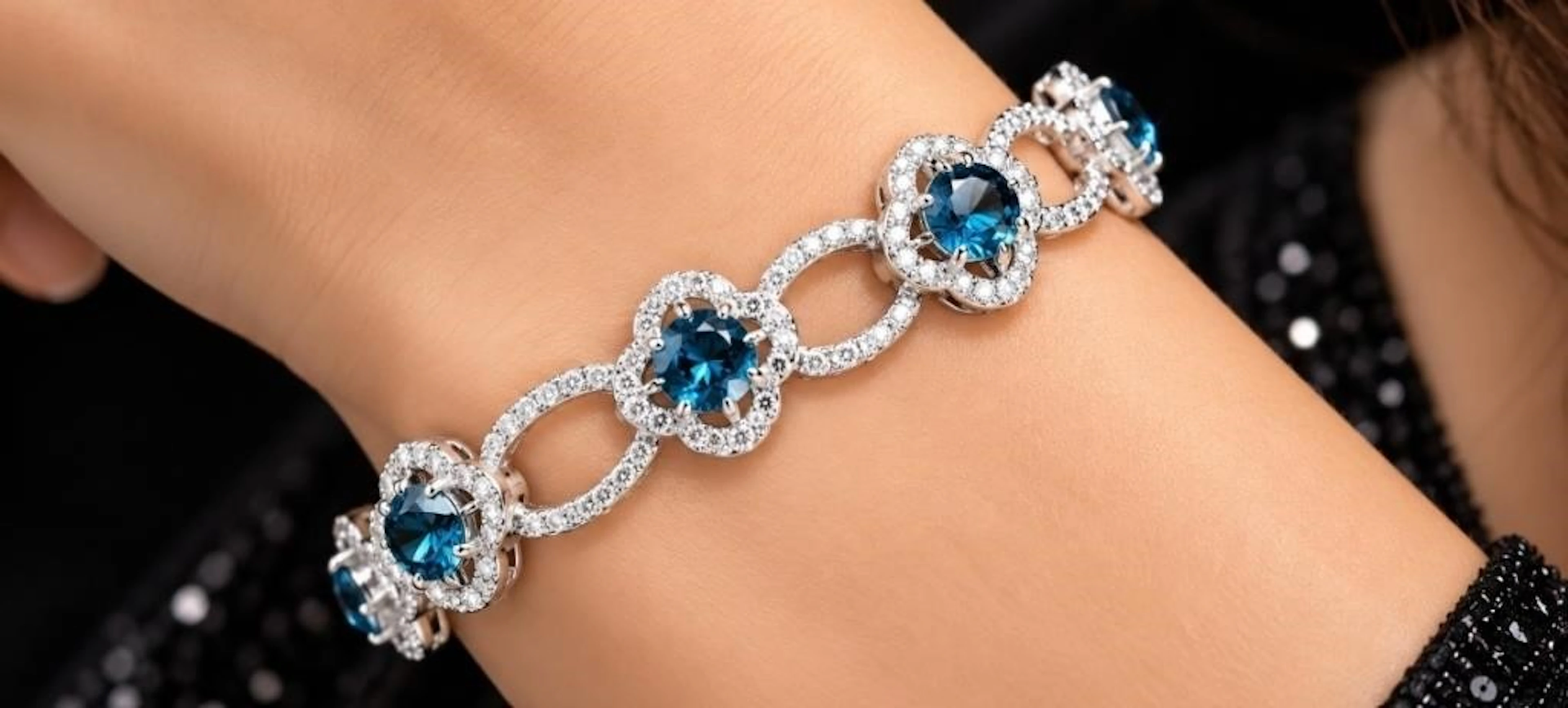 $1100, silver(18g), blue topaz (8.5ct)bracelet 7.5