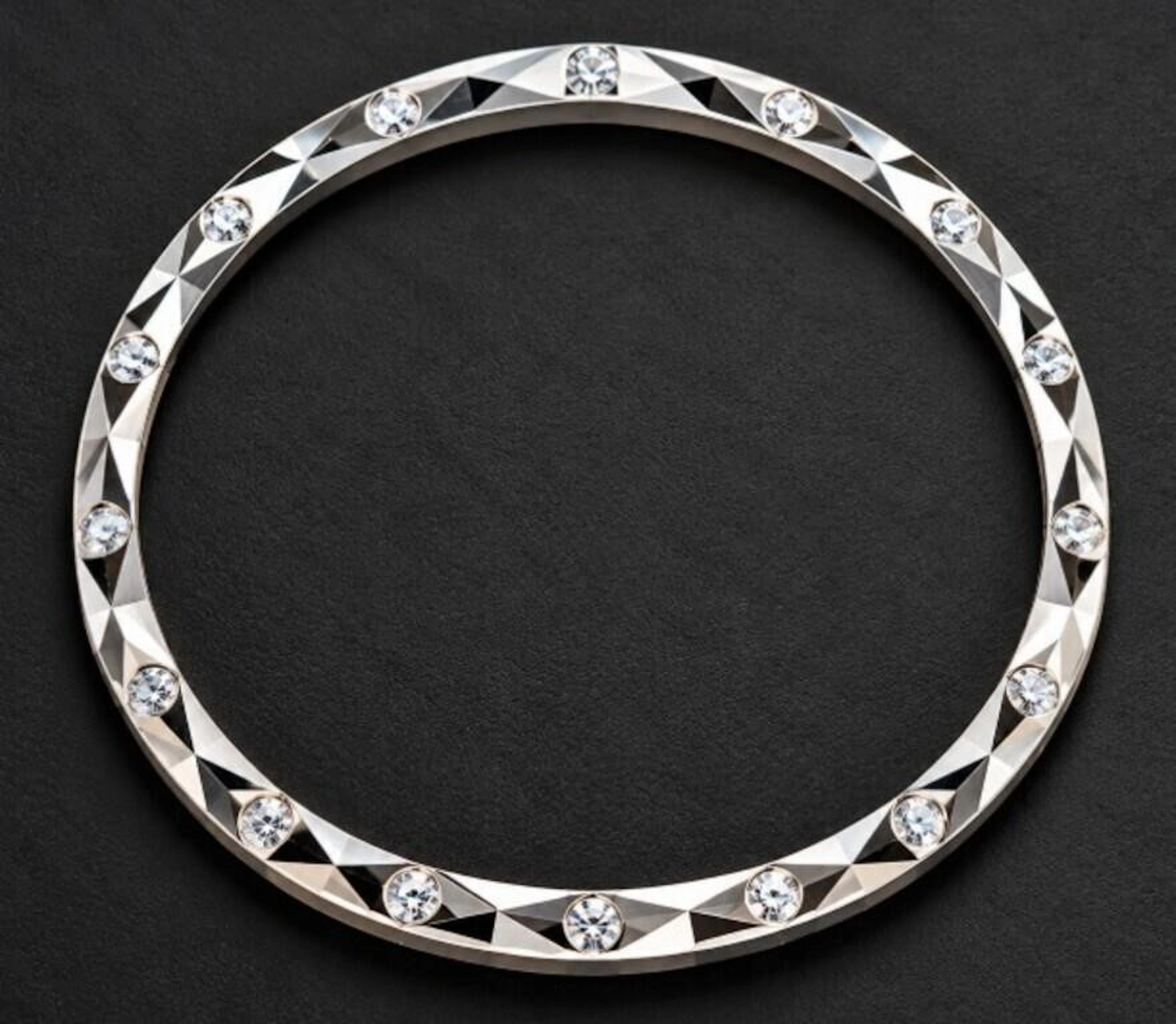 $380, silver (12.8g), bangle, retail value $380