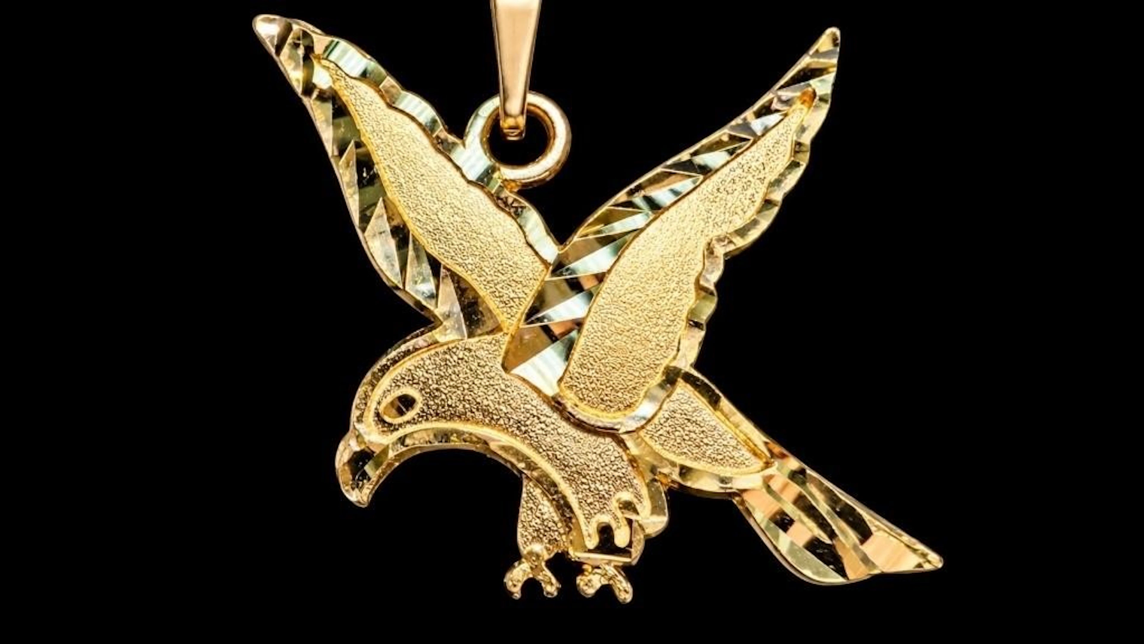 $630, 10k(0.88g), pendant, retail value $630