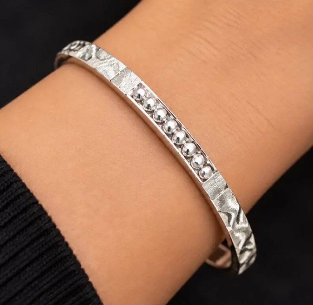 $320, silver(13g), bangle, retail value $320