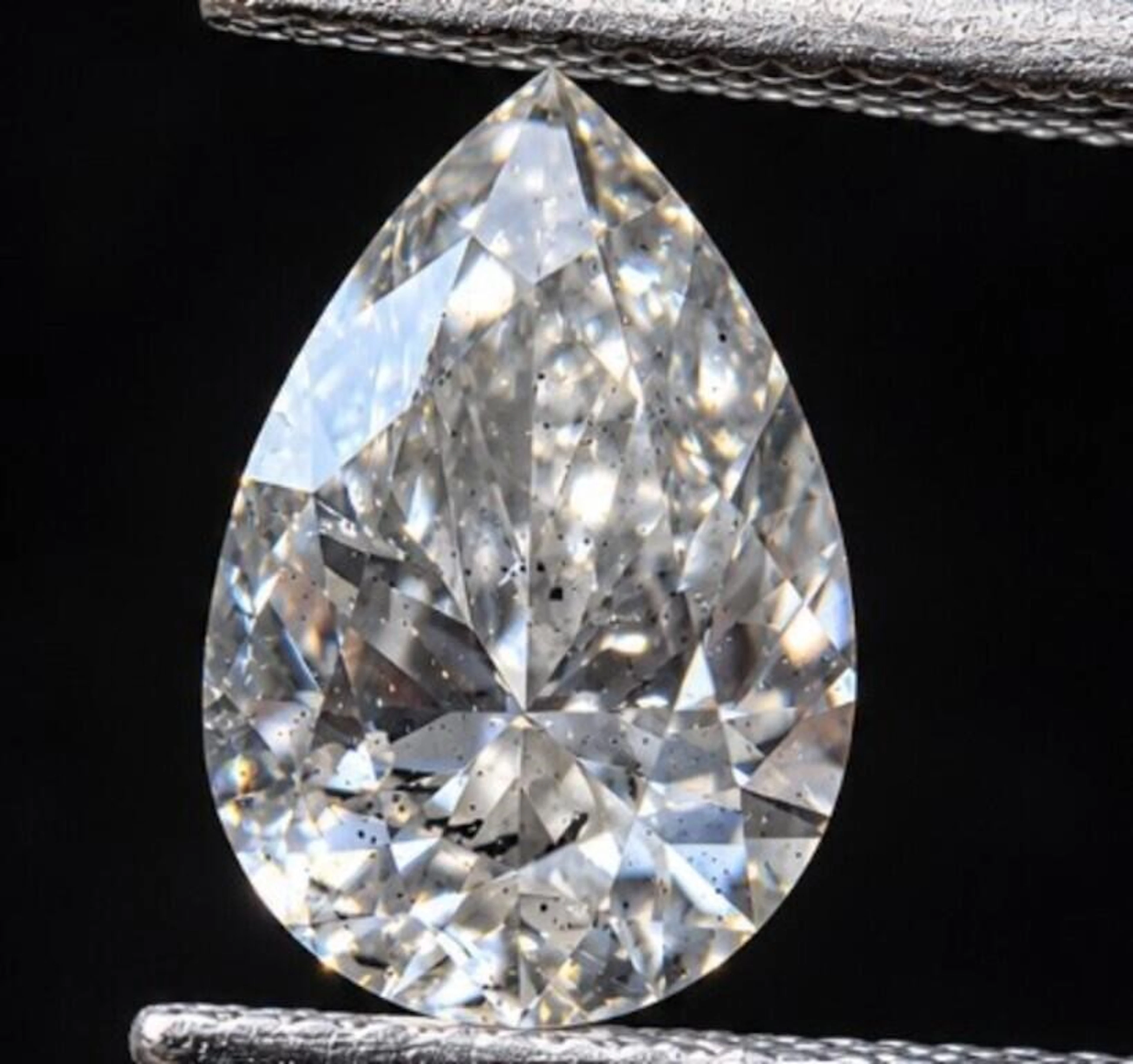 $6500 GIA Certified, natural diamond 1.52ct.PEAR B