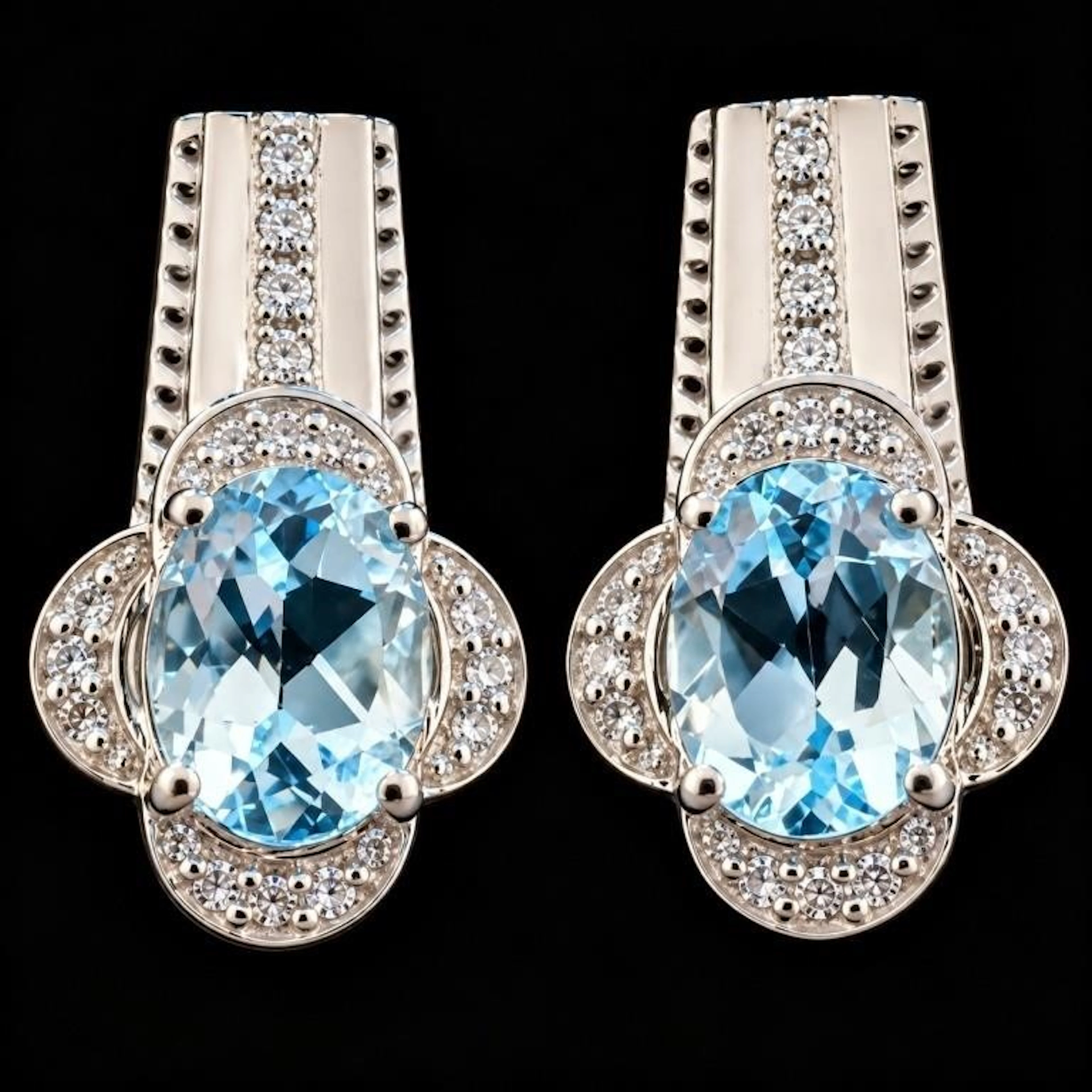 $200, silver(4.9g), blue topaz (0.5ct)earing, reta