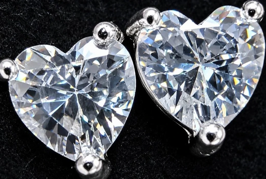 $50, silver cz earring, retail value $50