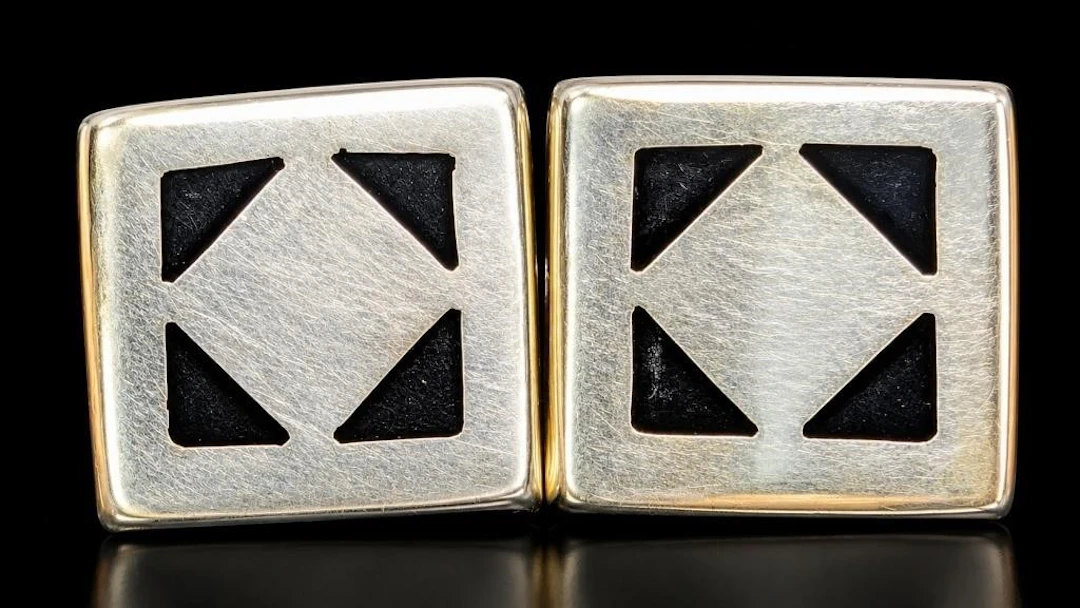 $400, silver(14.2g), earring, retail value $400
