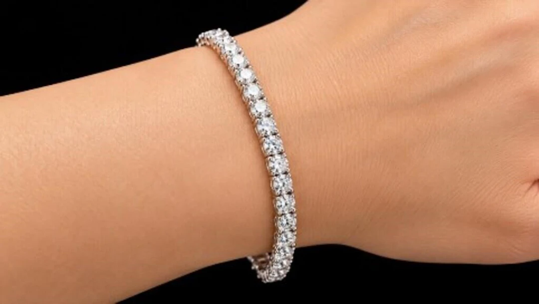 $6080, 14k(10.1g), diamond (1.6ct)bracelet 7", ap
