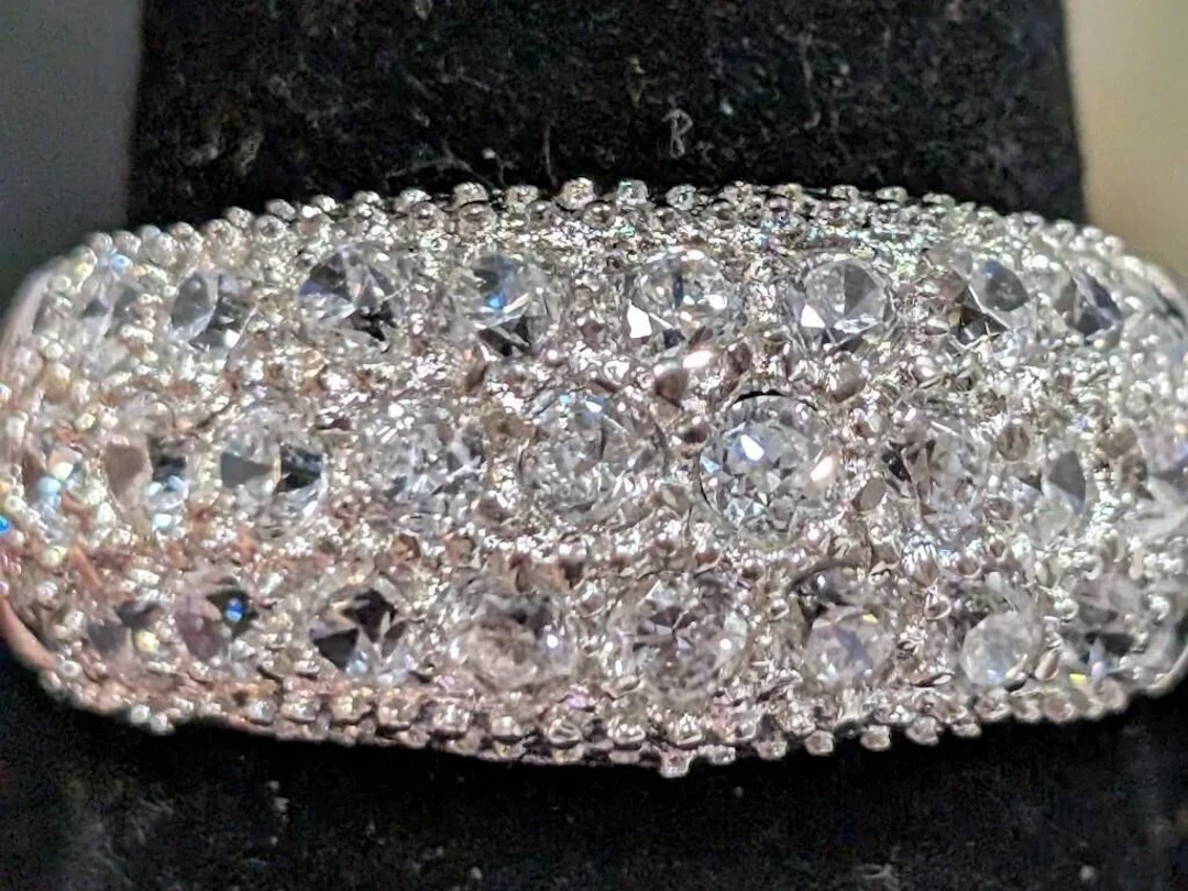 $200, Silver(7.78g), czRing, size 10.5, appraised/