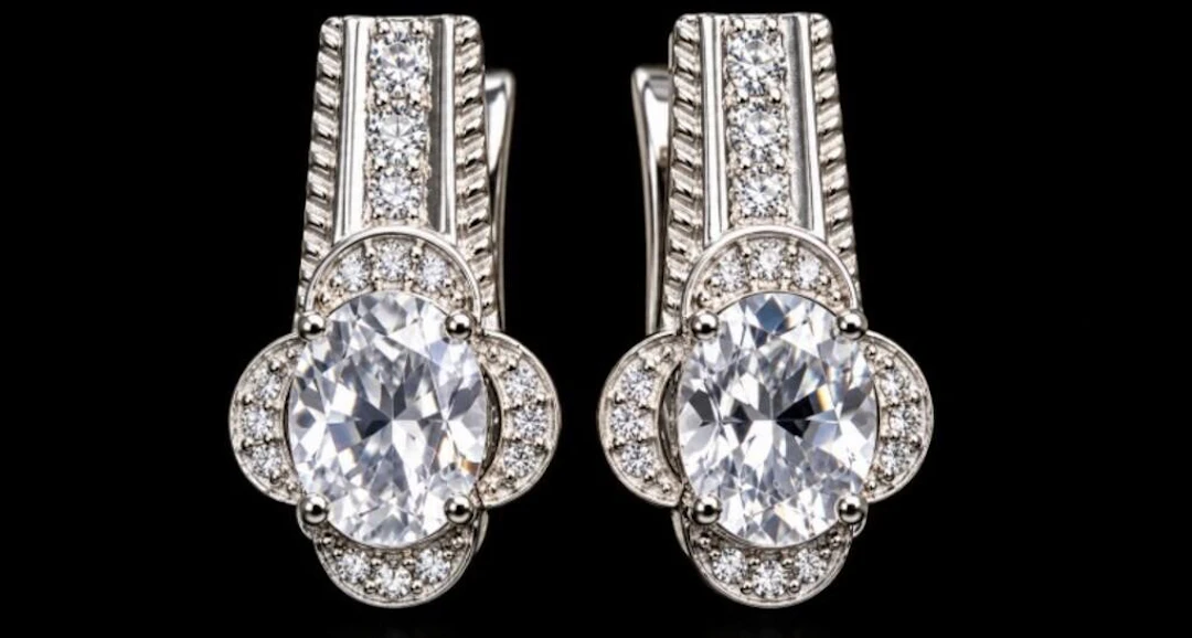 $340, silver(4.97g), white topaz (3ct)earing, reta