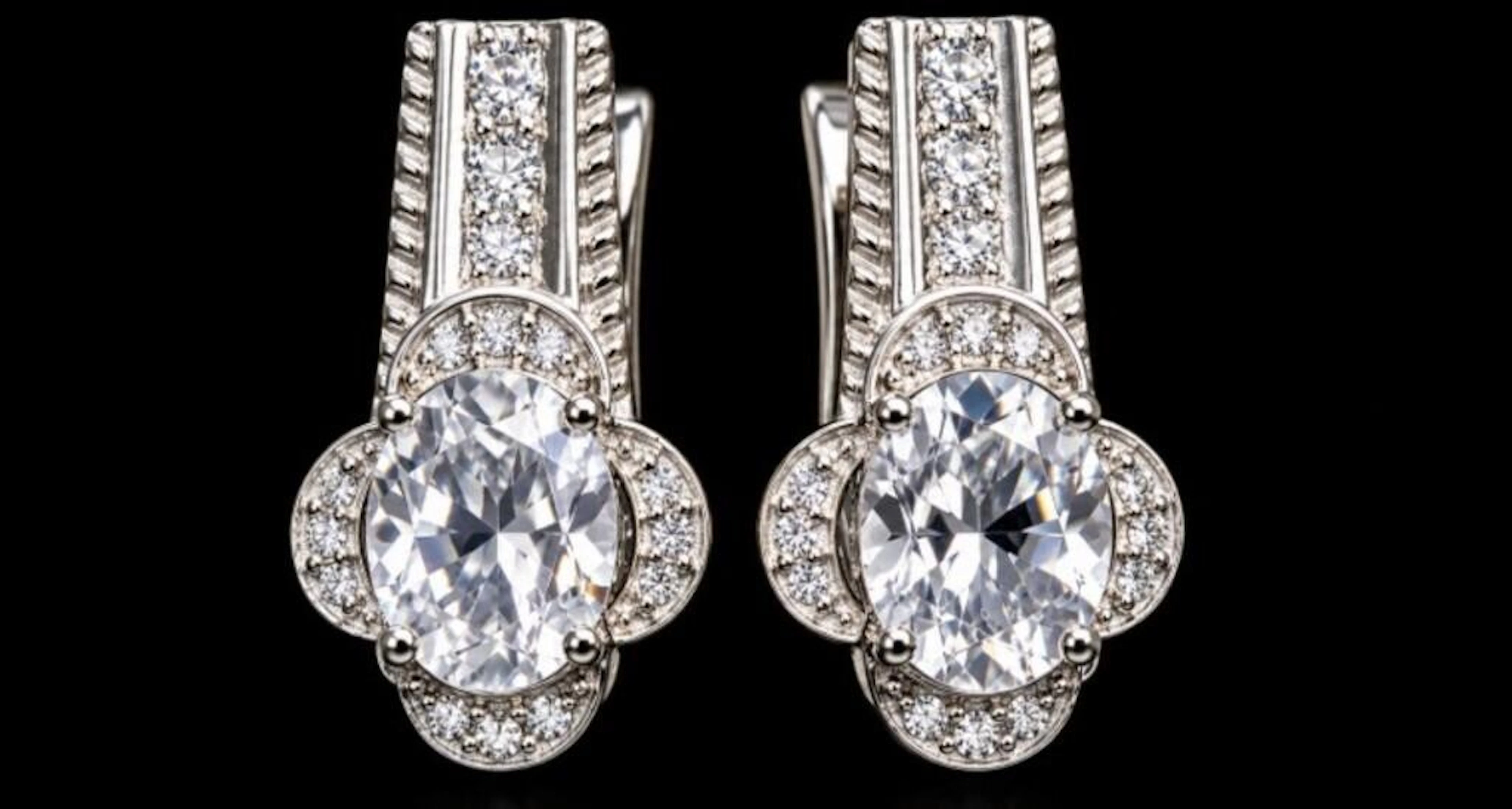 $340, silver(4.97g), white topaz (3ct)earing, reta