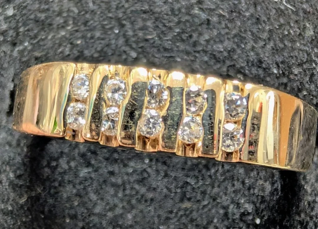 $3400, 14k(4.25g), czring, size 6.25, retail valu