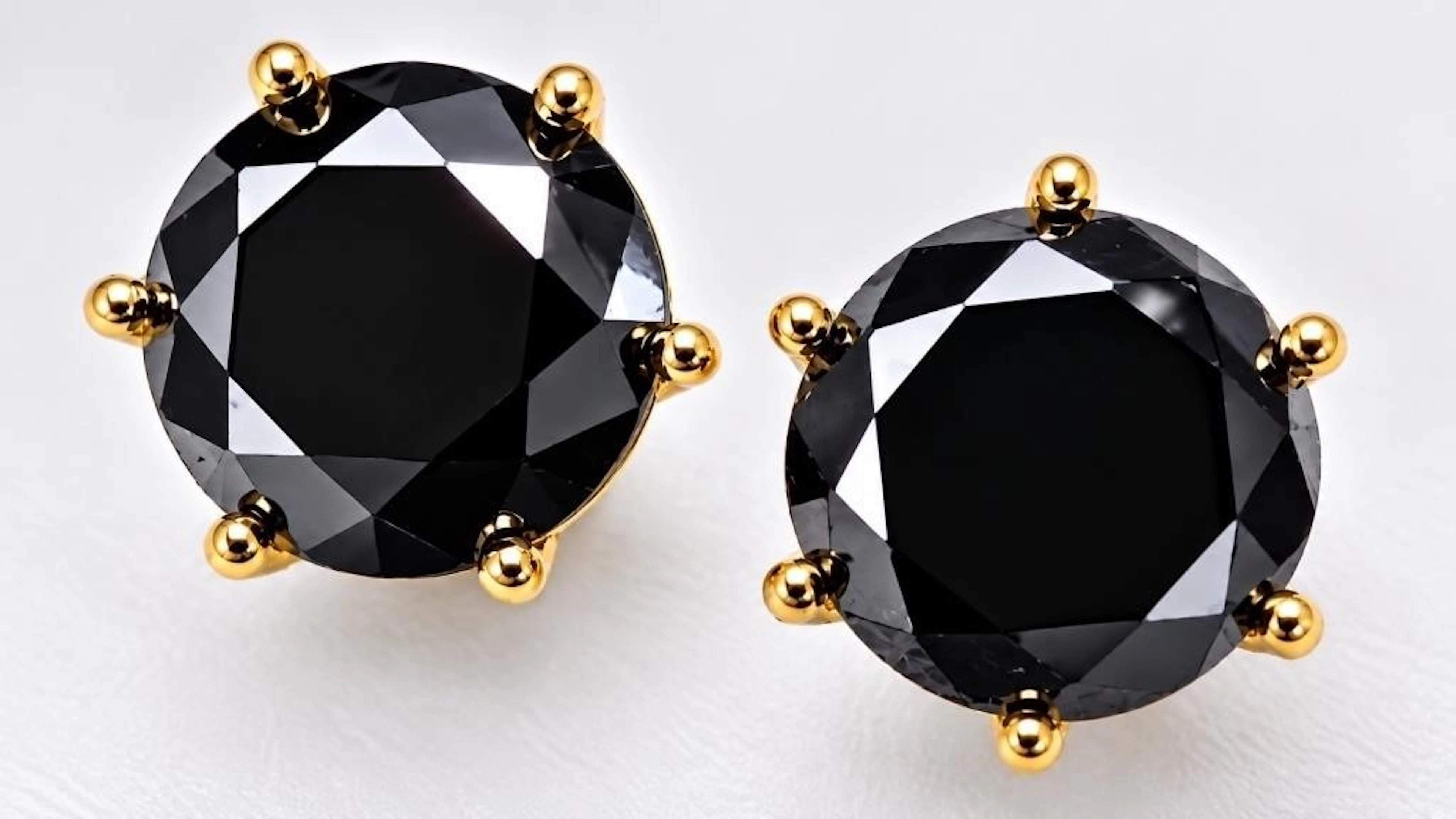 $1400, 14k(0.6g), black diamond (1.1ct) earring
