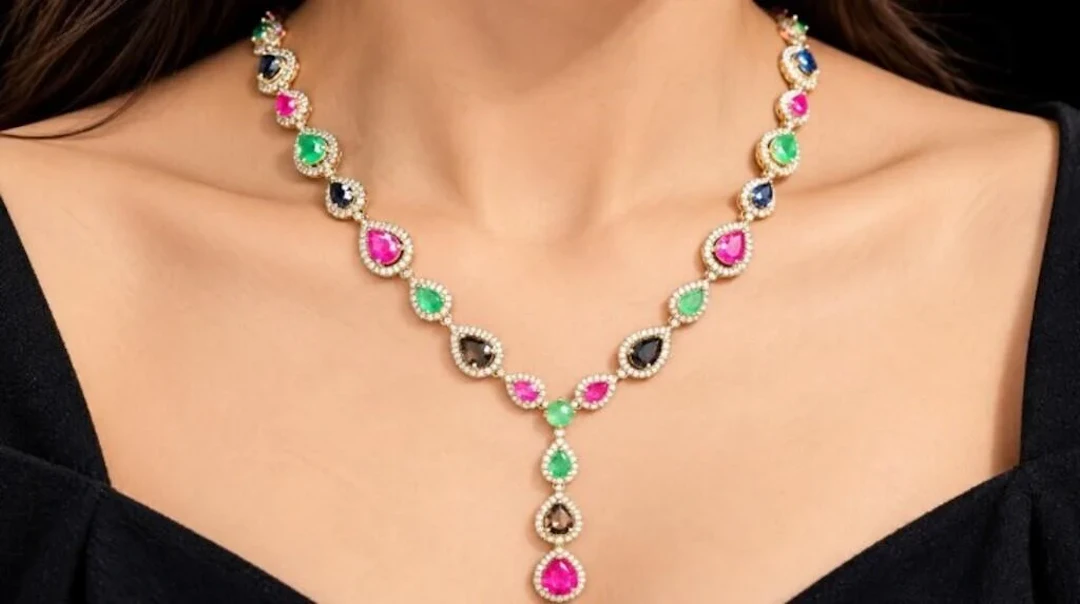 $2600, silver(33g), ruby, sapphire, emerald (32.5c