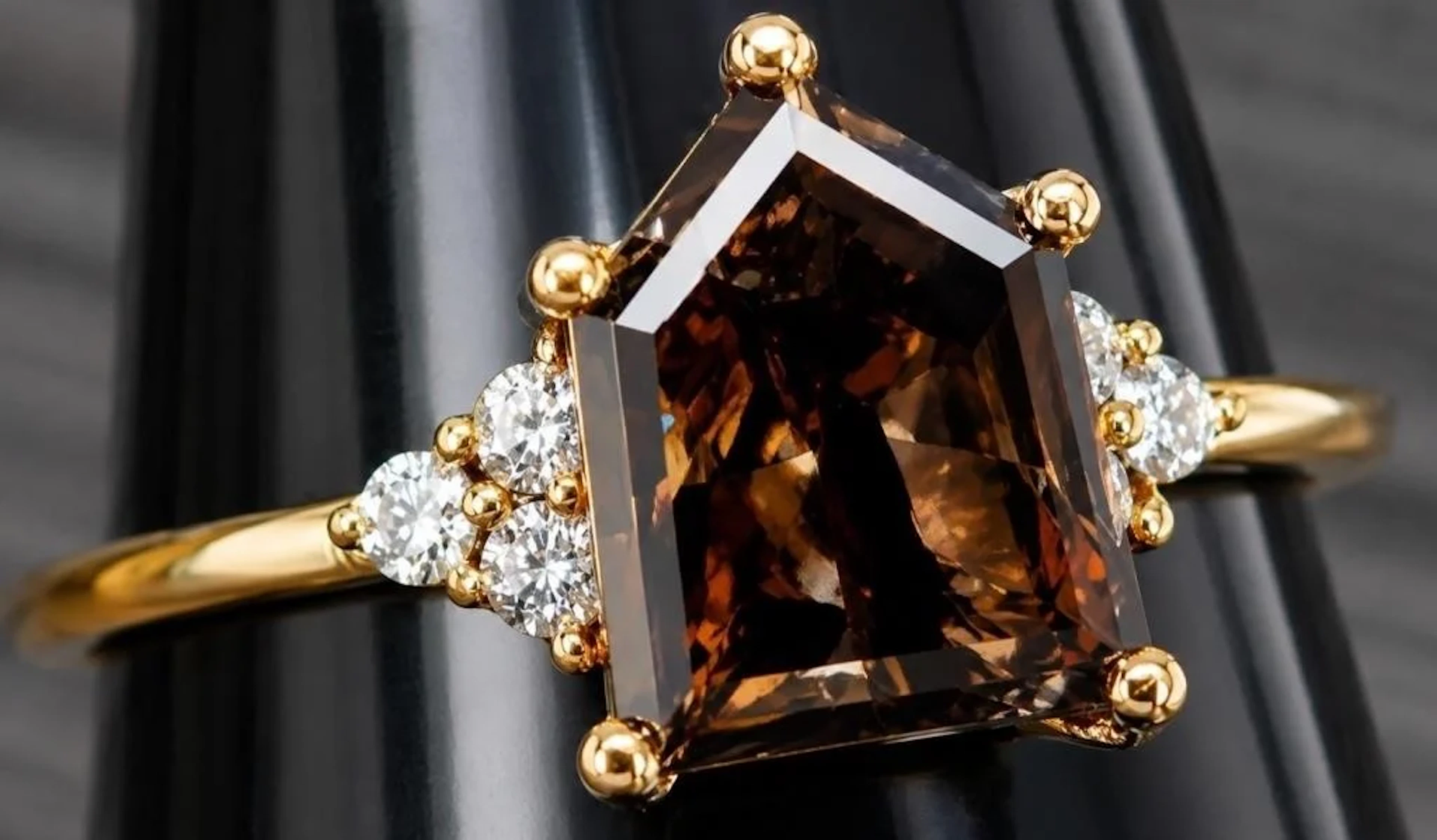 $2900, 10k(1.4g), natural color diamond (1.6+0.06c