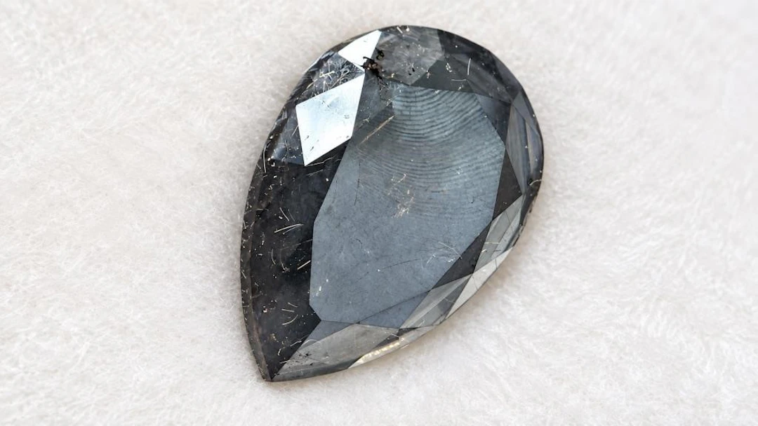 $1800, Treated black diamond (3.83ct)gemstone, ret