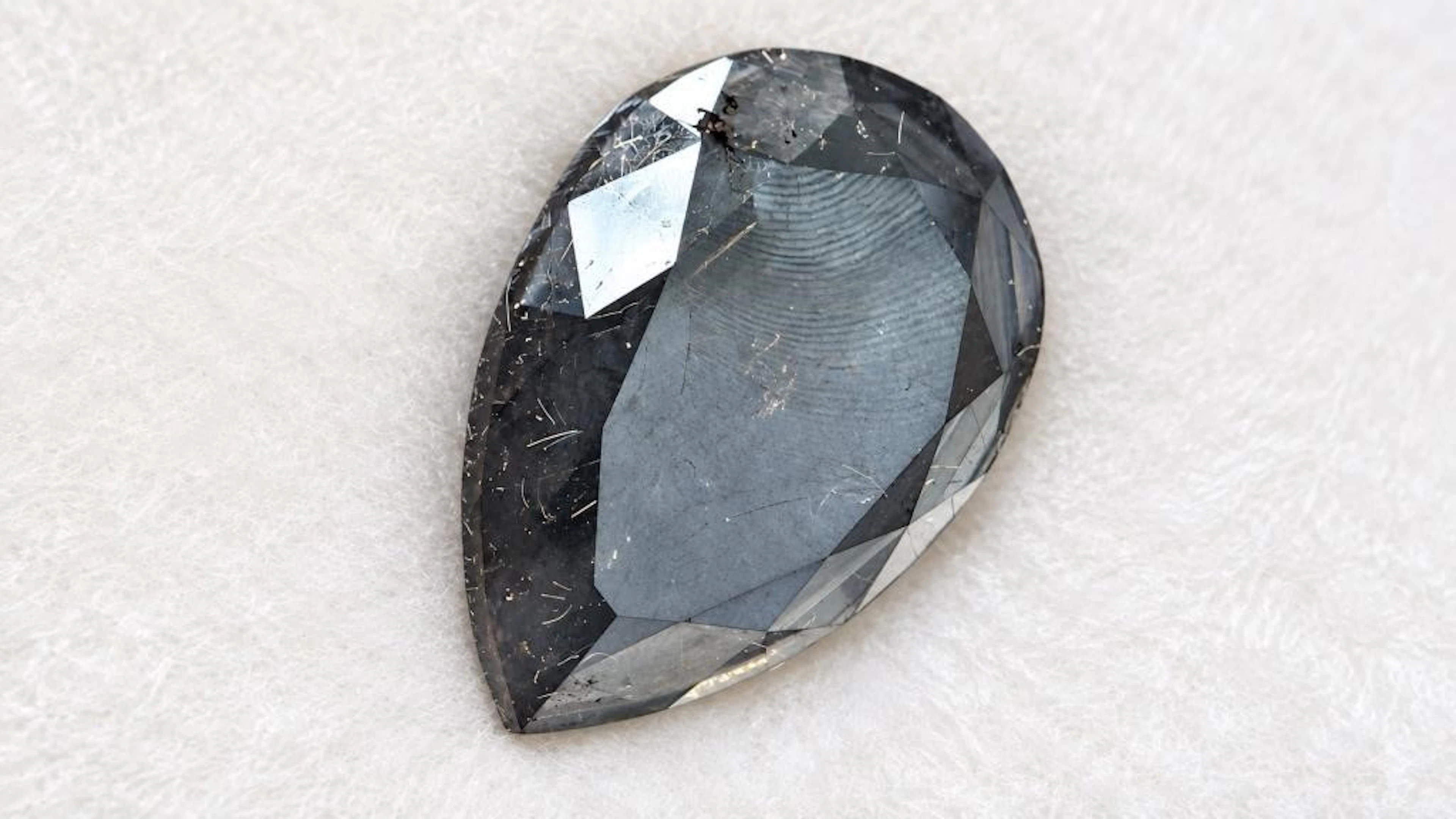 $1800, Treated black diamond (3.83ct)gemstone, ret