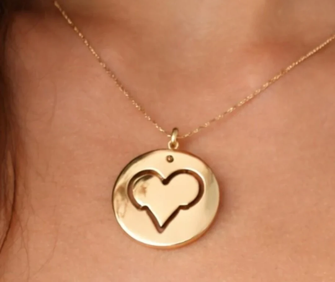 $1600, 10k(2.28g), pendant, retail value $1600