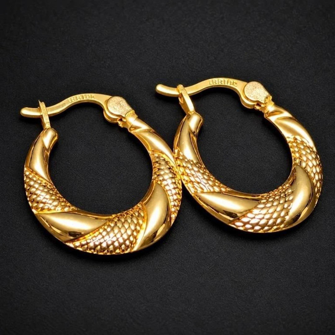 $600, 10k(0.9g), earring, retail value $600