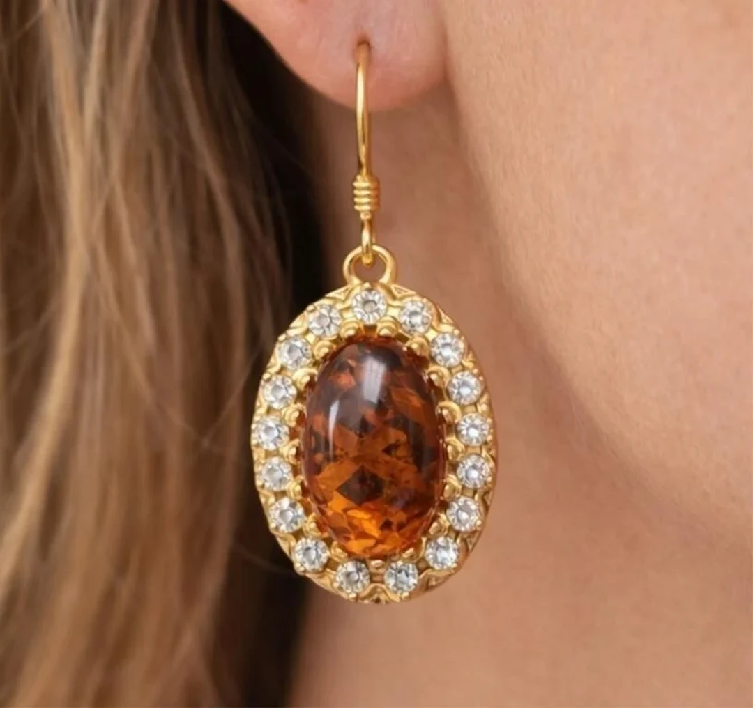 $400, silver(6.2g), amber earring, retail value $