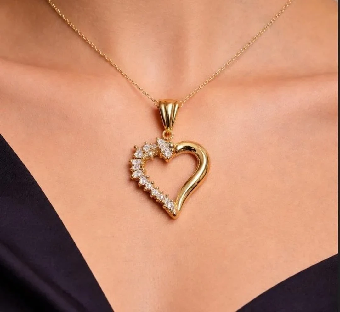 $1600, 10K(1.7g), Diamond (0.1ct)Pendant,MSRP $16
