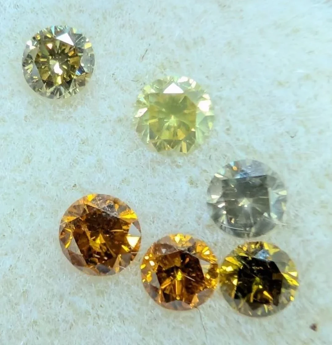 $300, natural loose fancy color diamond (0.8ct)