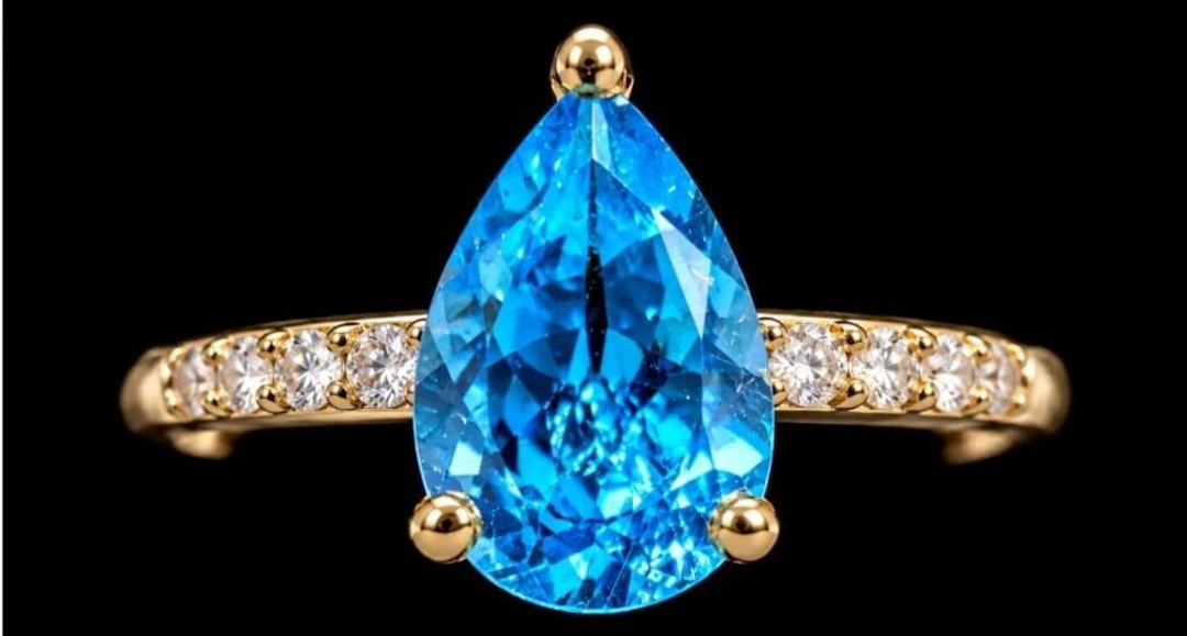 $2200, 10k(1.4g), blue topaz (1.2ct), diamond (0.0