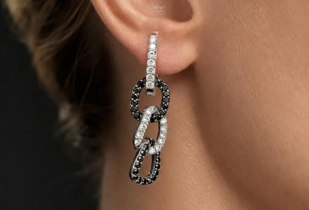 $4200, 10k(2.63g), natural diamond (0.55ct) earr