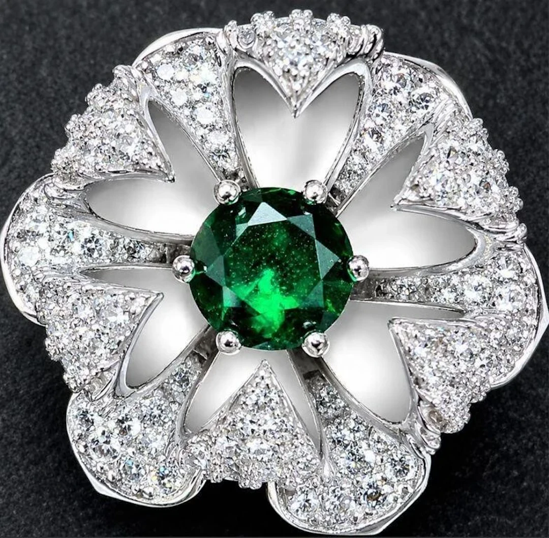 $350, silver(12.84g), unique blooming flower rin