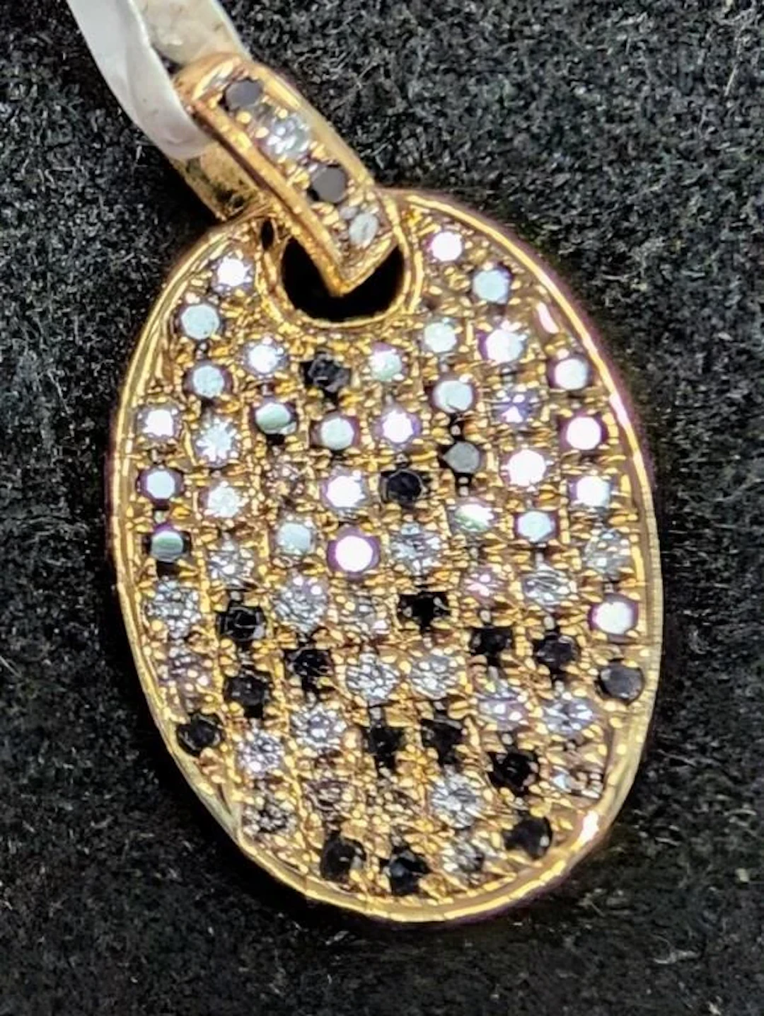 $1940, 14k(0.98g), natural diamond (0.35ct) penda