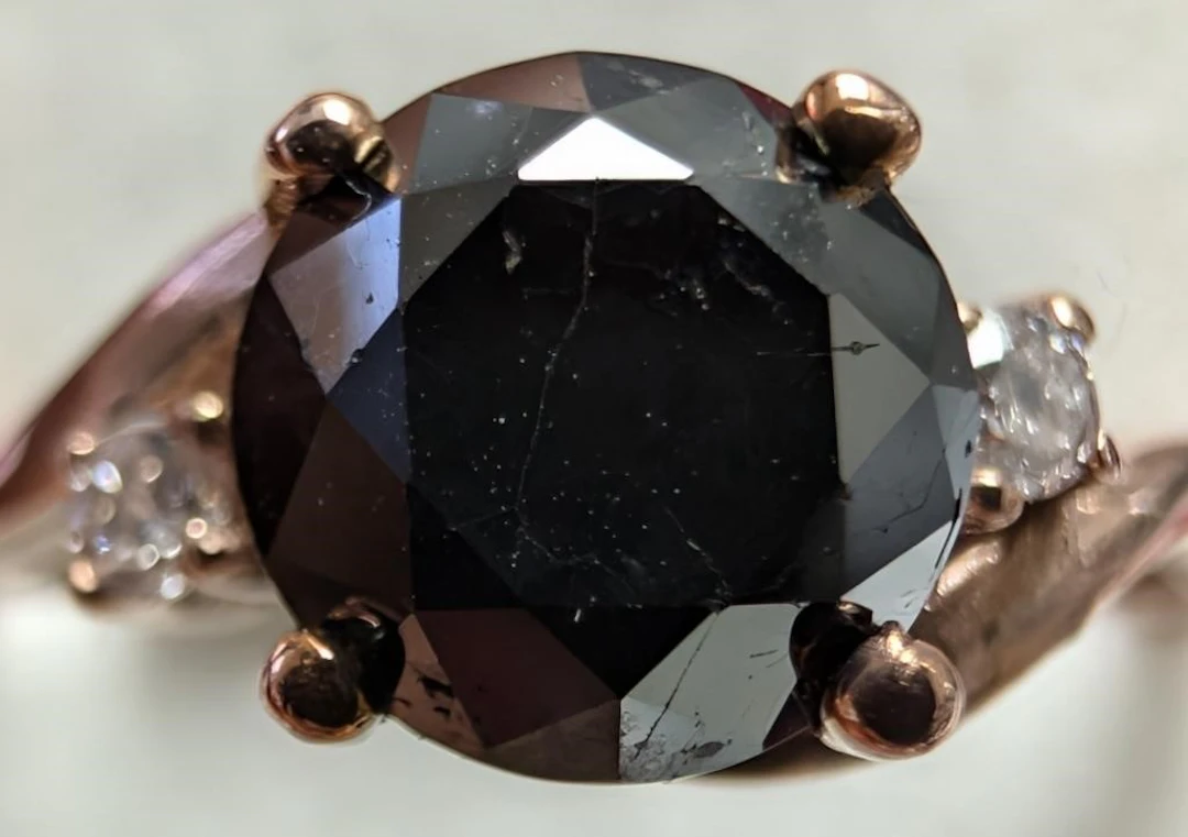 $2505, 10kblack diamond (1.8ct), diamond (0.12ct)r