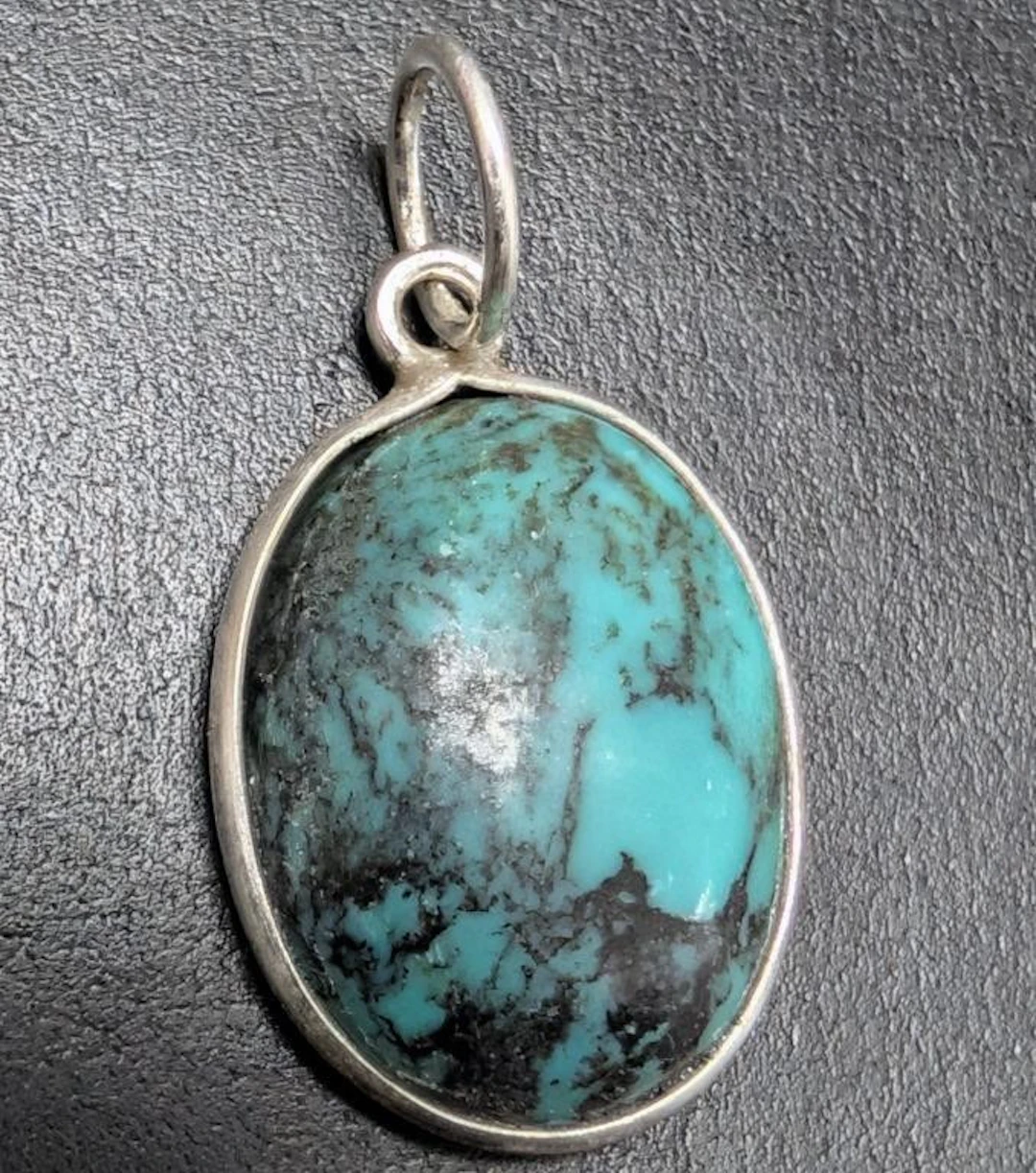 $120, silver turquoise pendant, retail value $120