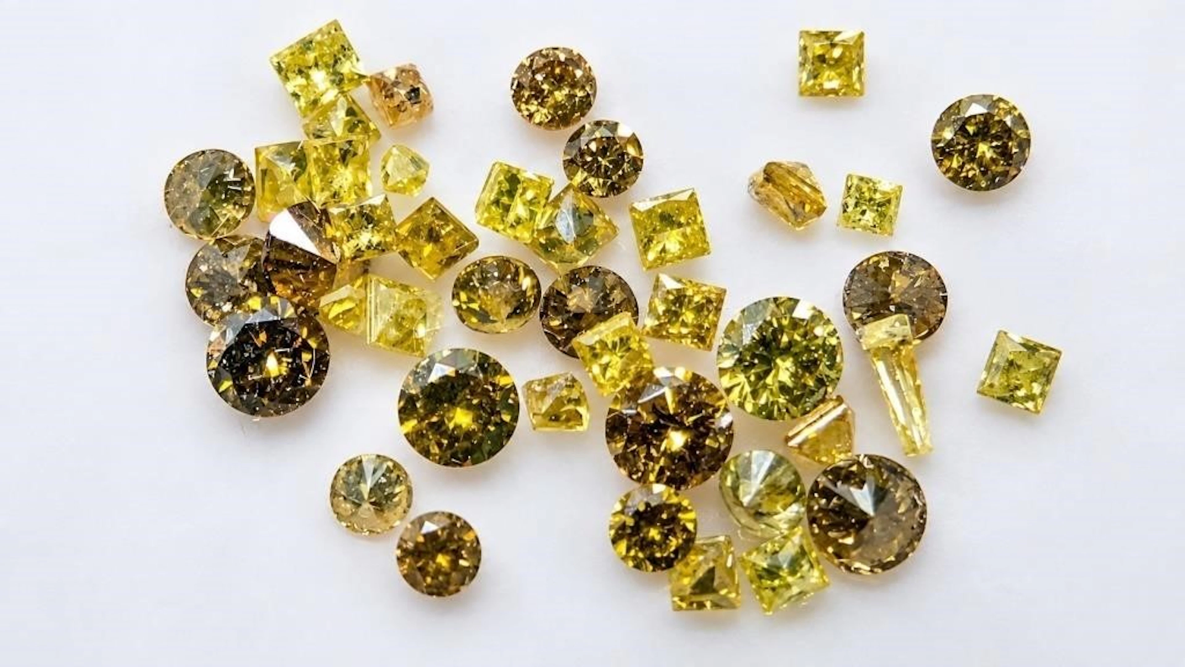 $600, yellow diamond treated (1ct)gemstone, retail