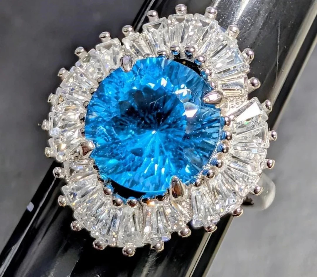 $500, silver(5.42g), blue topaz cz (3.5ct)ring, si