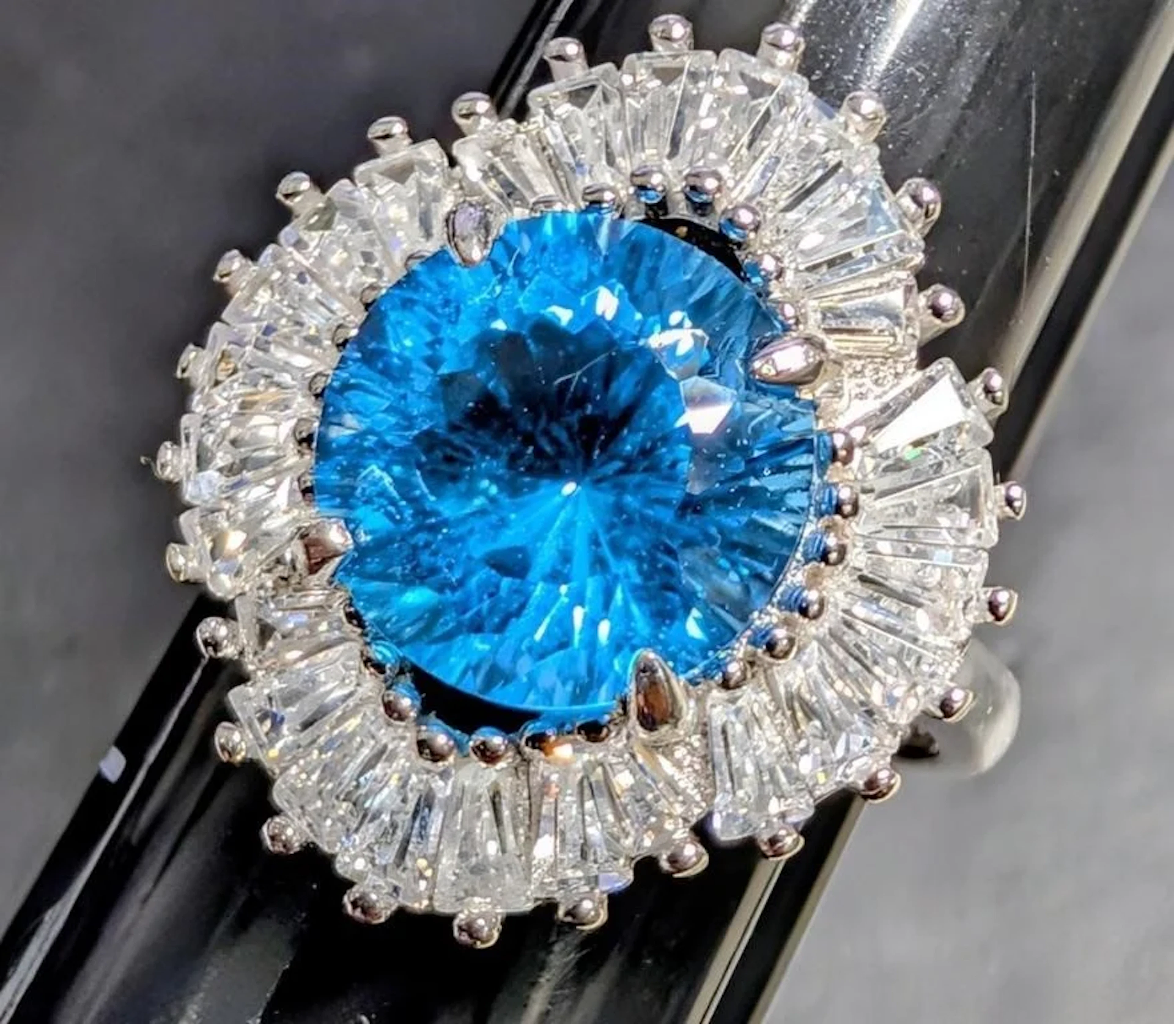 $500, silver(5.42g), blue topaz cz (3.5ct)ring, si