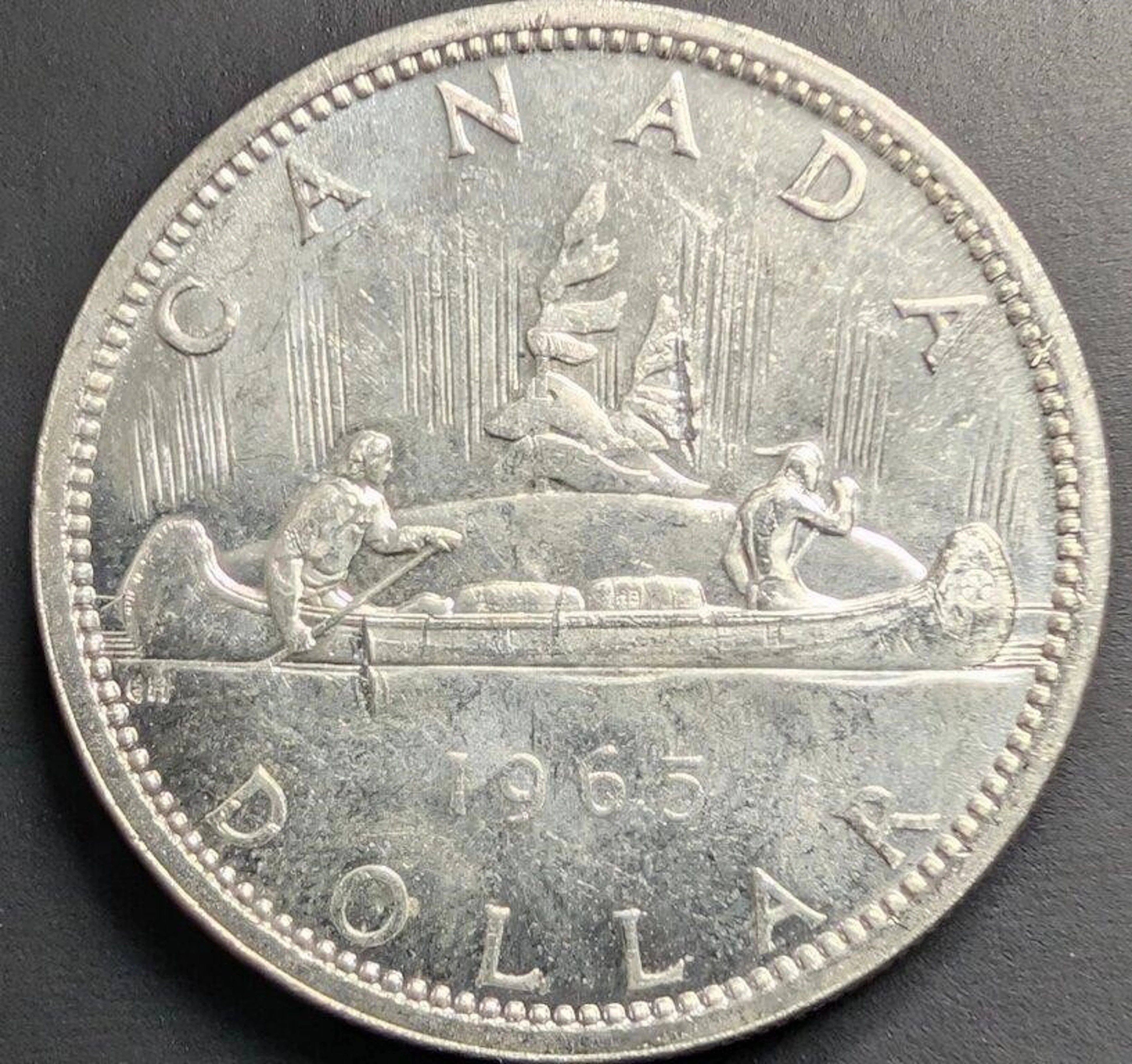 $400, silver(23.45g), random date coin, retail val