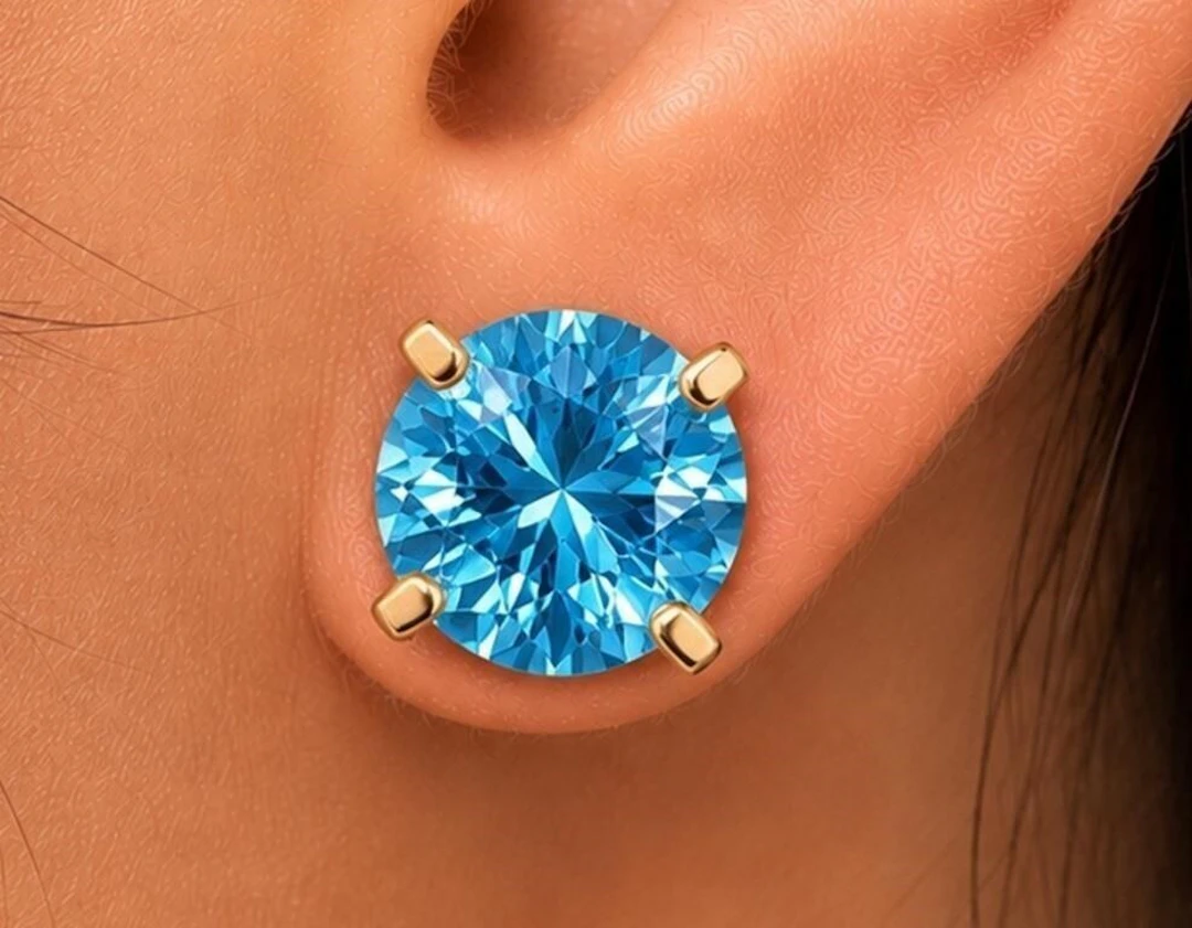$1600, 10k(1.28g), blue topaz (3.05ct)earring, re